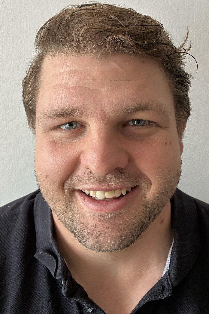 Portrait of Simon Raw